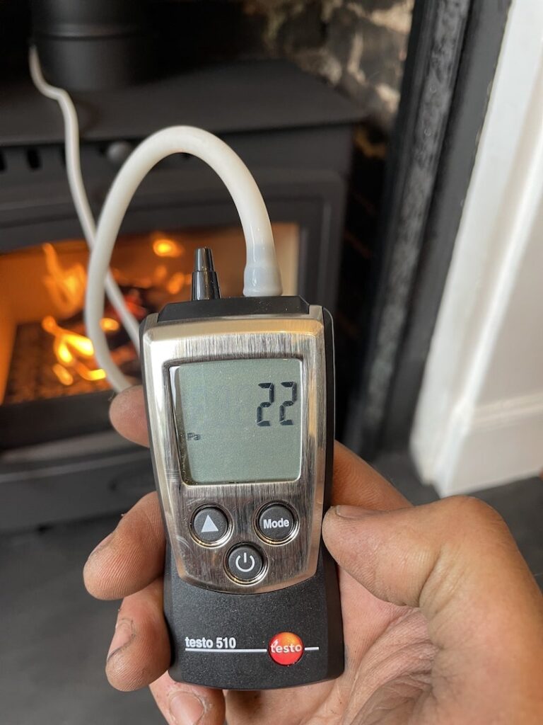 flue chimney draught test